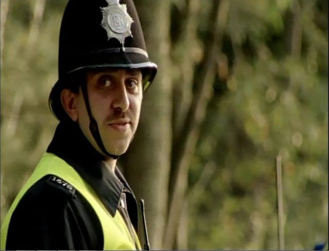 Adam dressed as a police constable